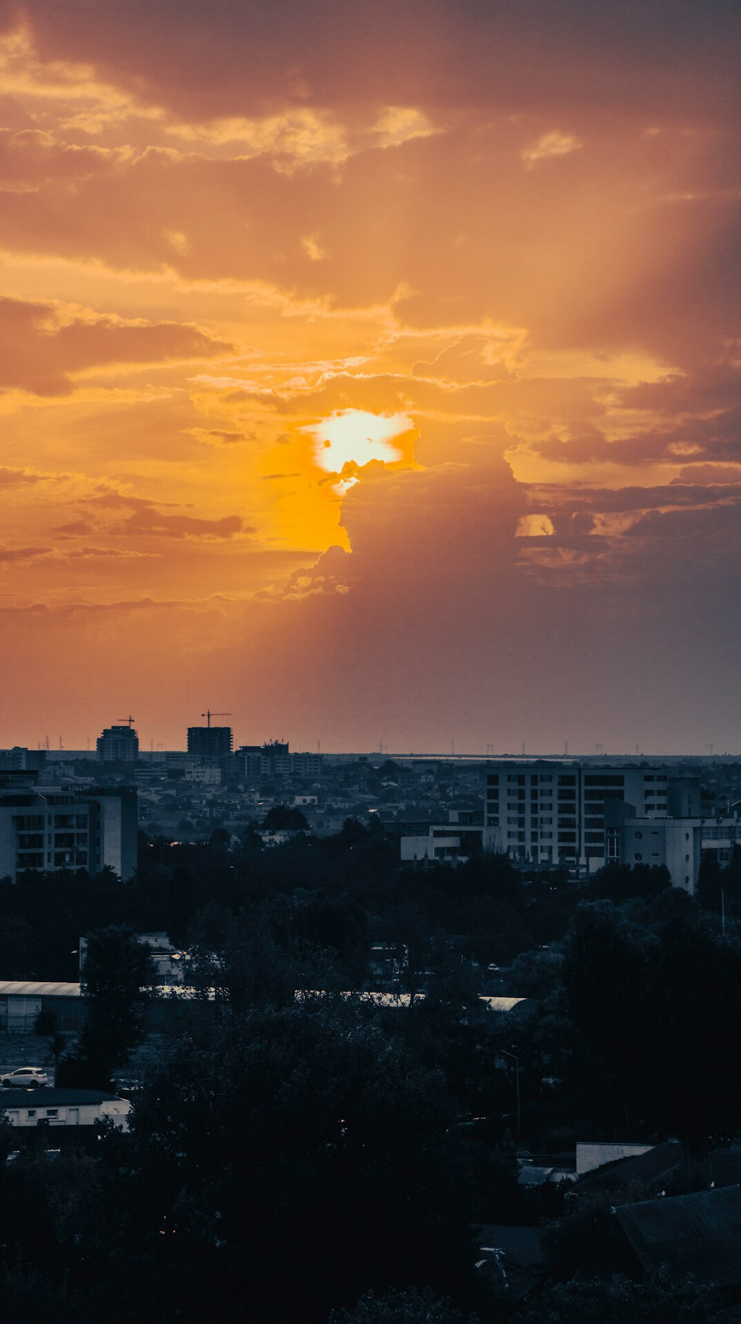 sunset over city buildings